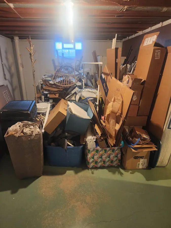 Roll-off dumpster container at job site for 4 Yard Dumpster Rental in Metamora